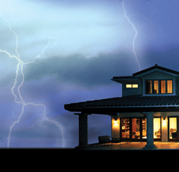 house with lightning in background