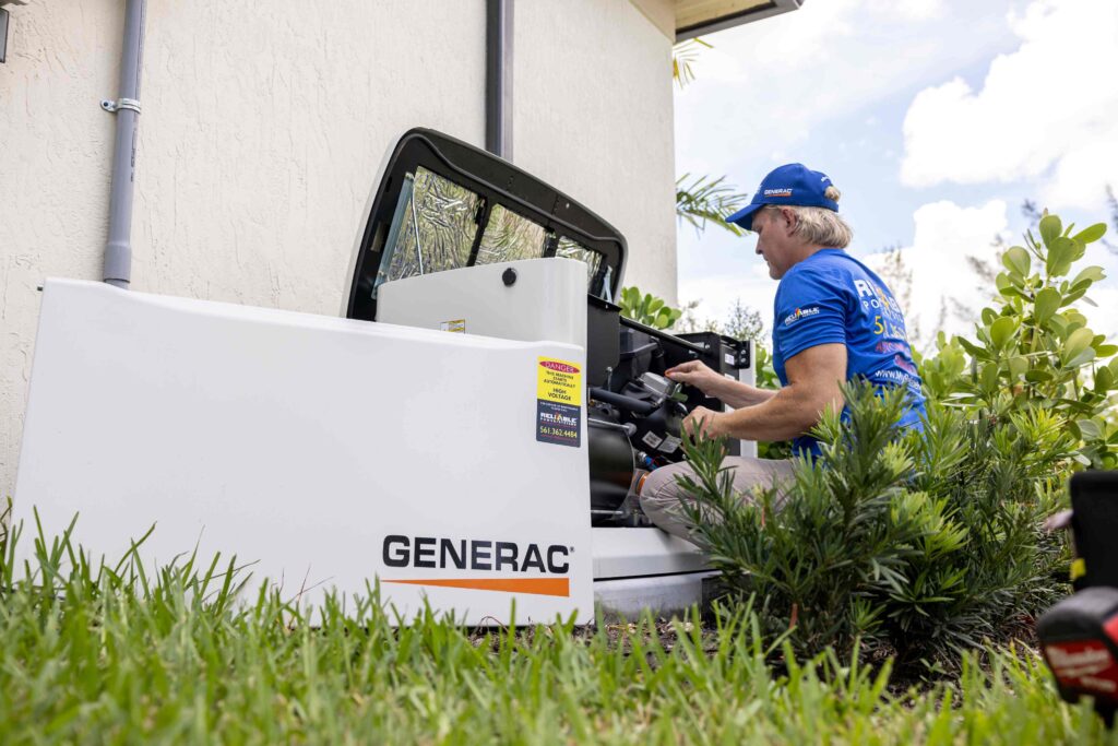 Team Member Fixing a Generac Generator