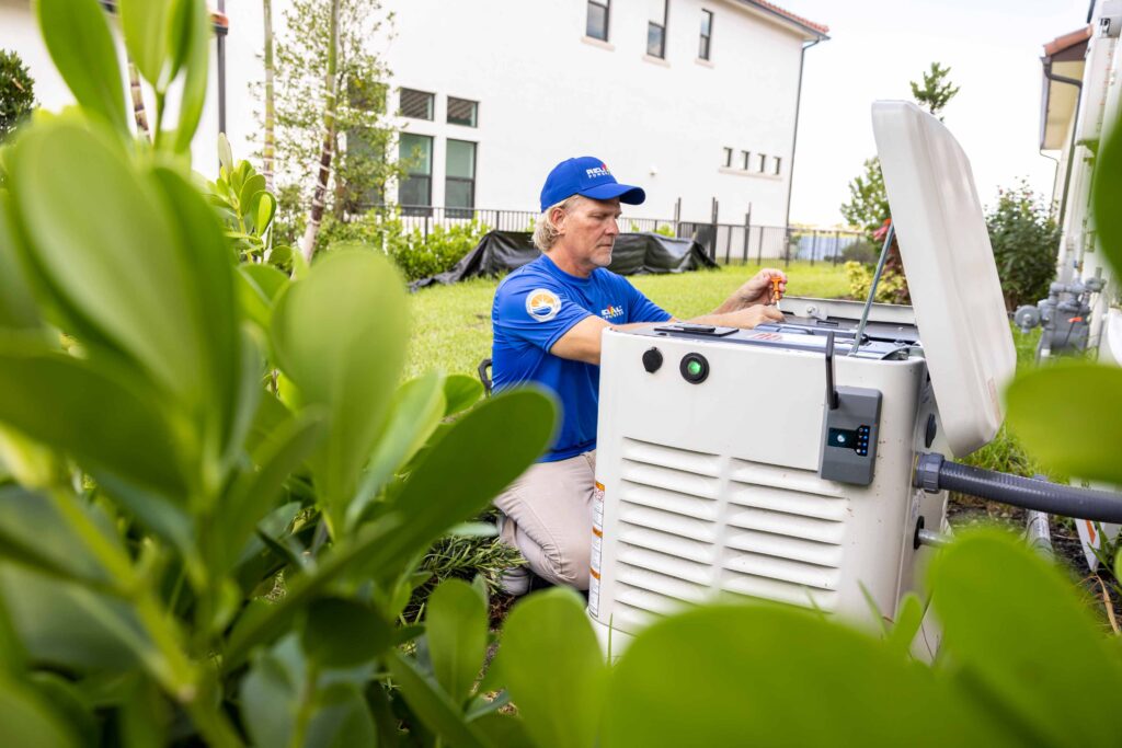 Reliable Power Systems Team Member Fixing a Standby Generator